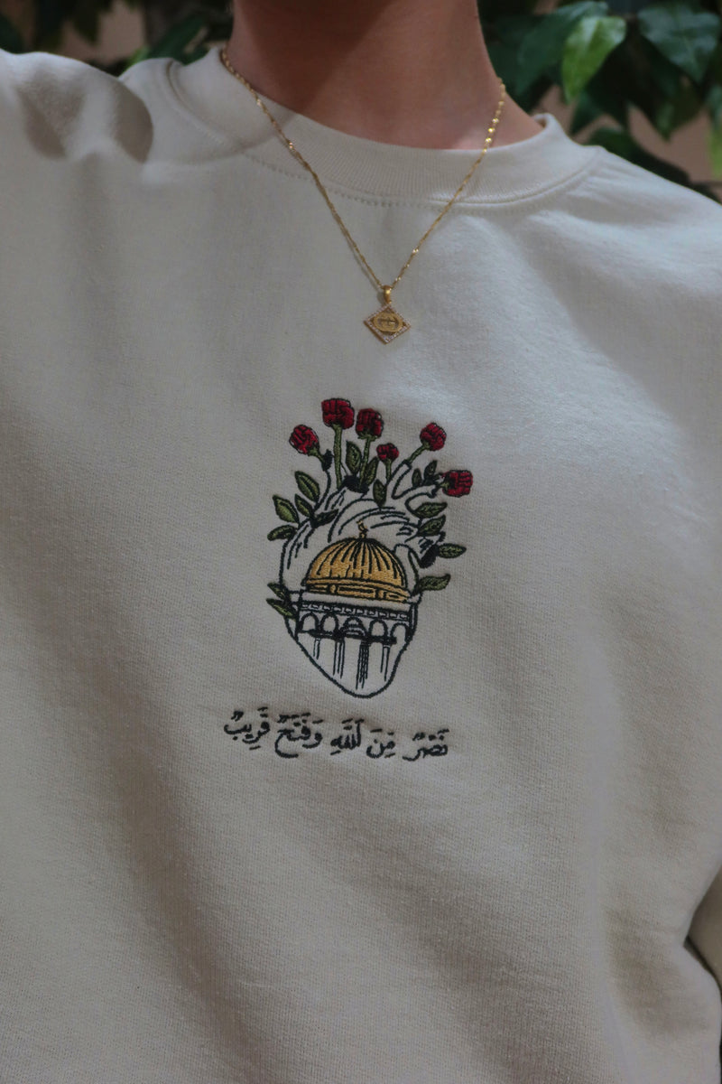 Victory from Allah and an imminent conquest {61:13} embroidered crewneck